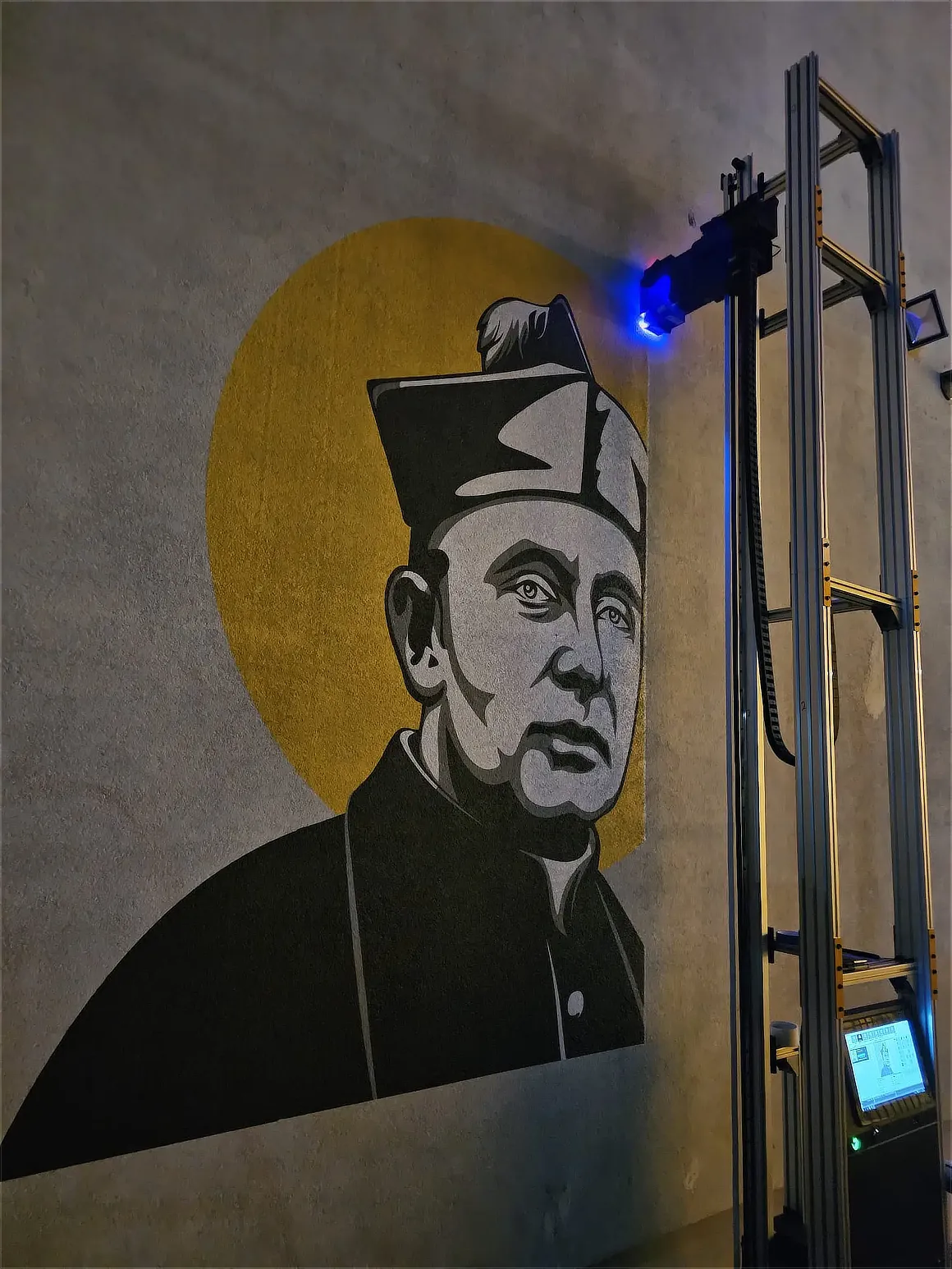 Wydruk patrona Collegium Leonium o powierzchni ponad 7 m kw. na zewnętrznej elewacji